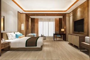 3d rendering beautiful luxury bedroom suite in hotel with tv and working table